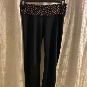 Black workout leggings with unique waistband design